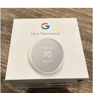 Google Nest Thermostat in White and Gray